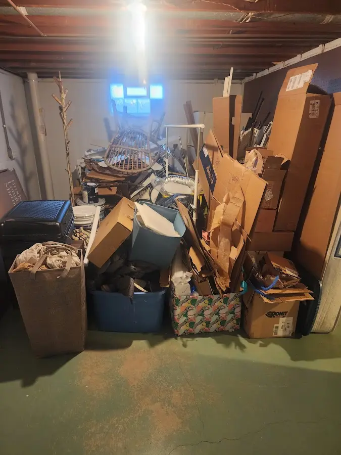 Roll-off dumpster container at job site for 8 Yard Dumpster Rental in Groesbeck